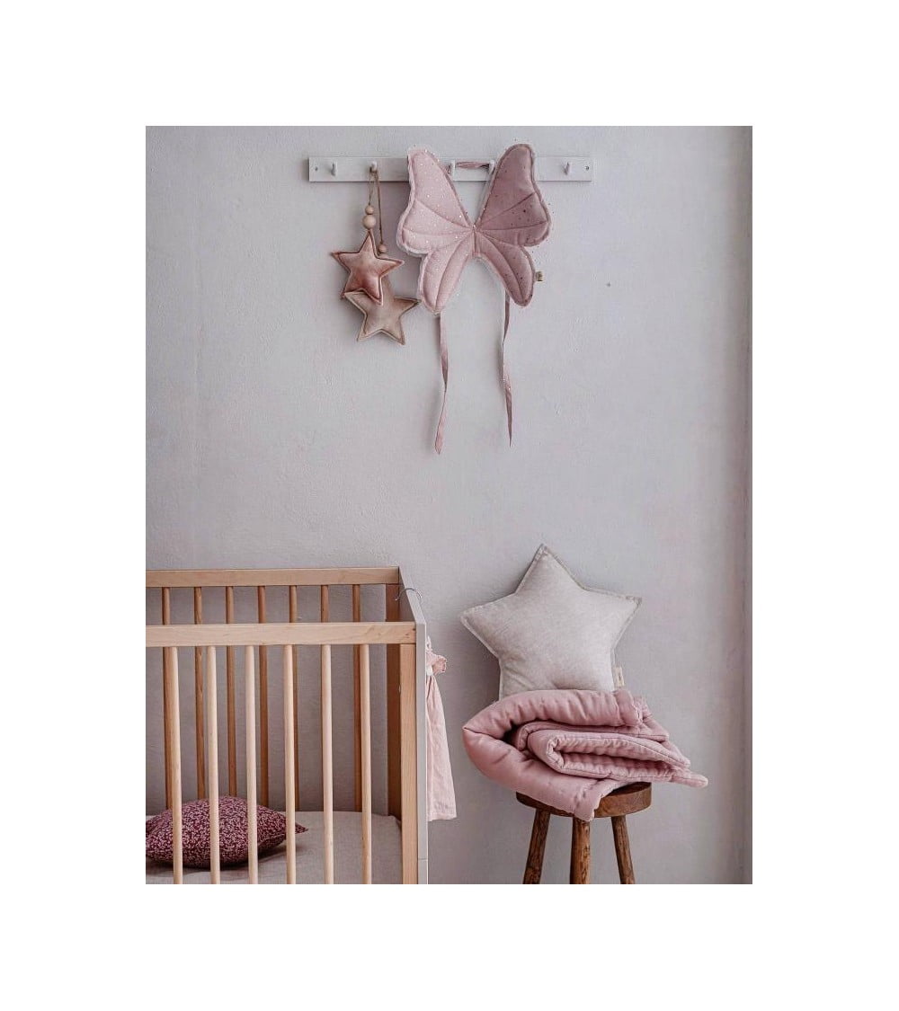 Baby room with bed and deco star velvet pendant with two wooden beads