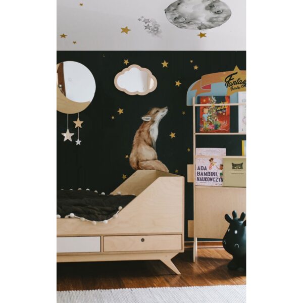 Children's room with a wall sticker of a fox looking at the moon and the stars