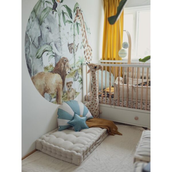 Baby room with baby cot with natural Linen bed bumper