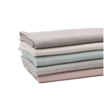 Folded fleece bio cotton blankets in five colors: beige, ecru, mint, gray and pink