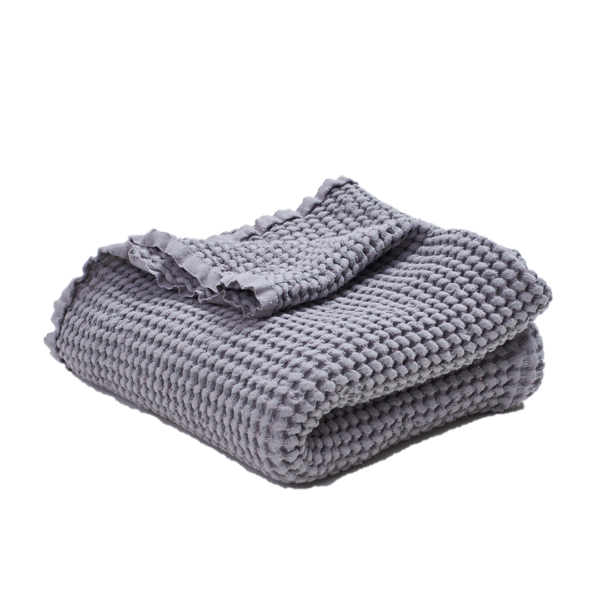 A folded Waffle Baby linen blanket in gray colour