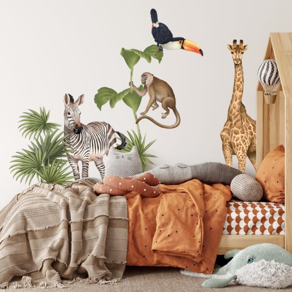 Kids room with wall stickers with a zebra, giraffe, monkey, tucan and plants